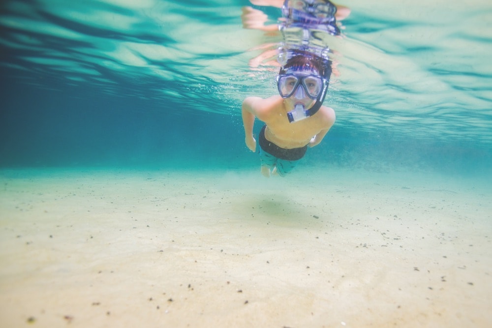 Chase Cramer snorkels in a swimming hole along Econfina Creek.