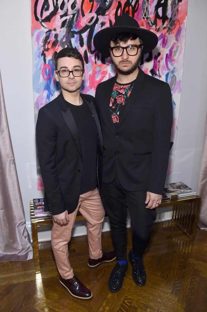 Christian Siriano and Brad Walsh attend the opening of Christian Siriano's new store, The Curated NYC, hosted by Alicia Silverstone and sponsored by VIE Magazine on April 17, 2018, in New York City. Photo by Jamie McCarthy/Getty Images for Christian Siriano