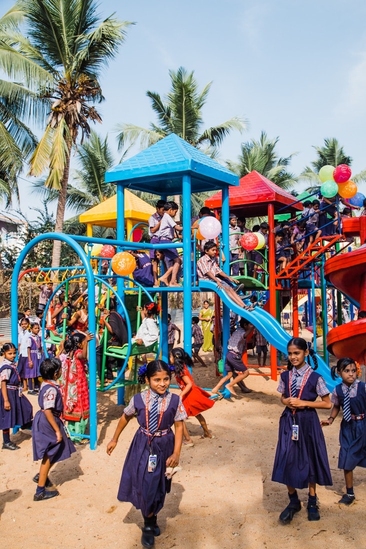 Children playing in the new playground at IREF, VIE Magazine June 2018