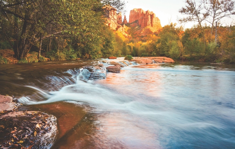 A picturesque view of the water at Red Rock State Park from Oak Creek near L’Auberge de Sedona in Arizona