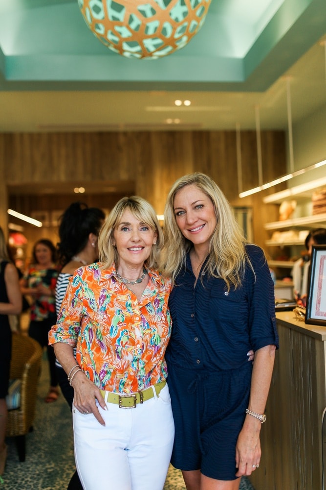 Lisa Burwell and Laurie Hood at VIE Magazine's sip and shop at JMcLaughlin in Grand Boulevard Town Center benefiting Alaqua Animal Refuge
