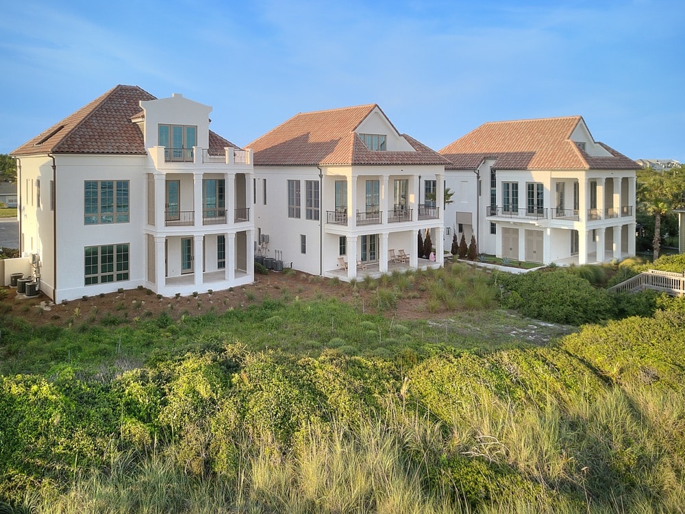 The luxurious three-home gated compound at 24–44 Escape Drive in Inlet Beach, Florida, is available for purchase. Visit LindaMillerLuxury.com to learn more.