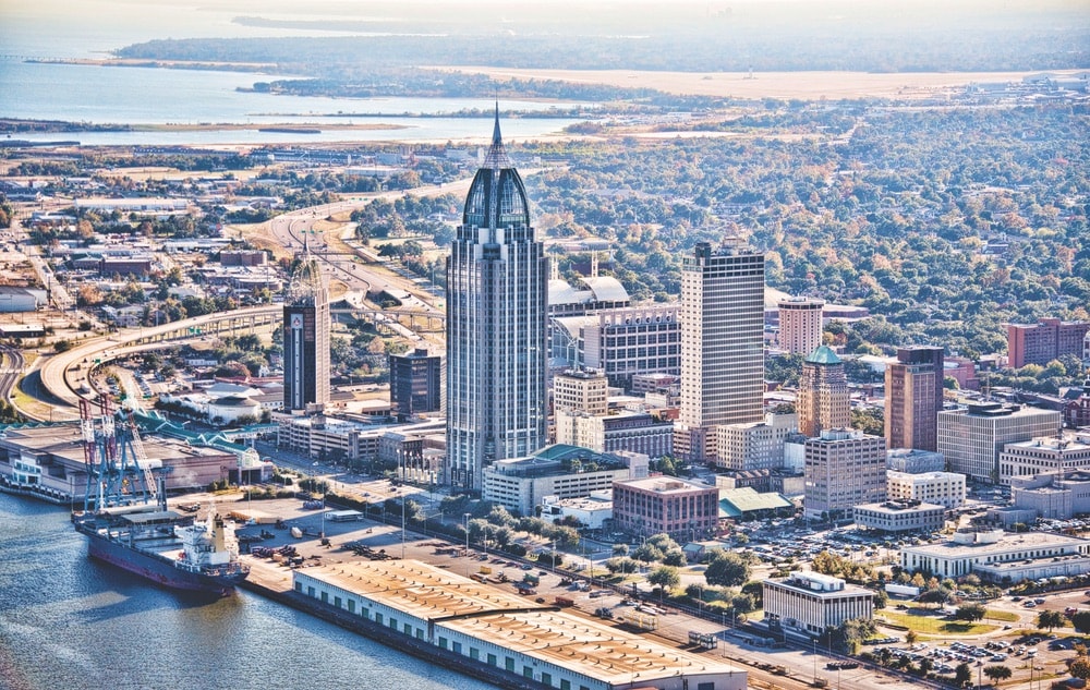 Mobile’s skyline and the port of Mobile—considered the ninth busiest port in the nation.