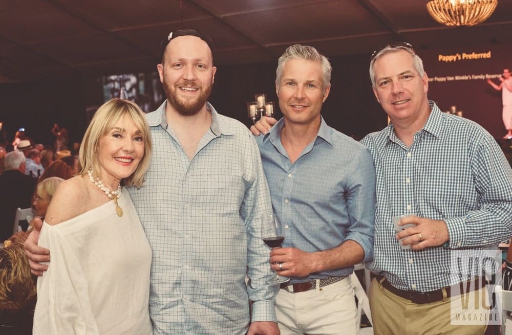 Lisa Burwell, Tyson Peterson, Daned Kirkham, and Eric Wagenknecht at the Destin Charity Wine Auction Foundation (DCWAF) event