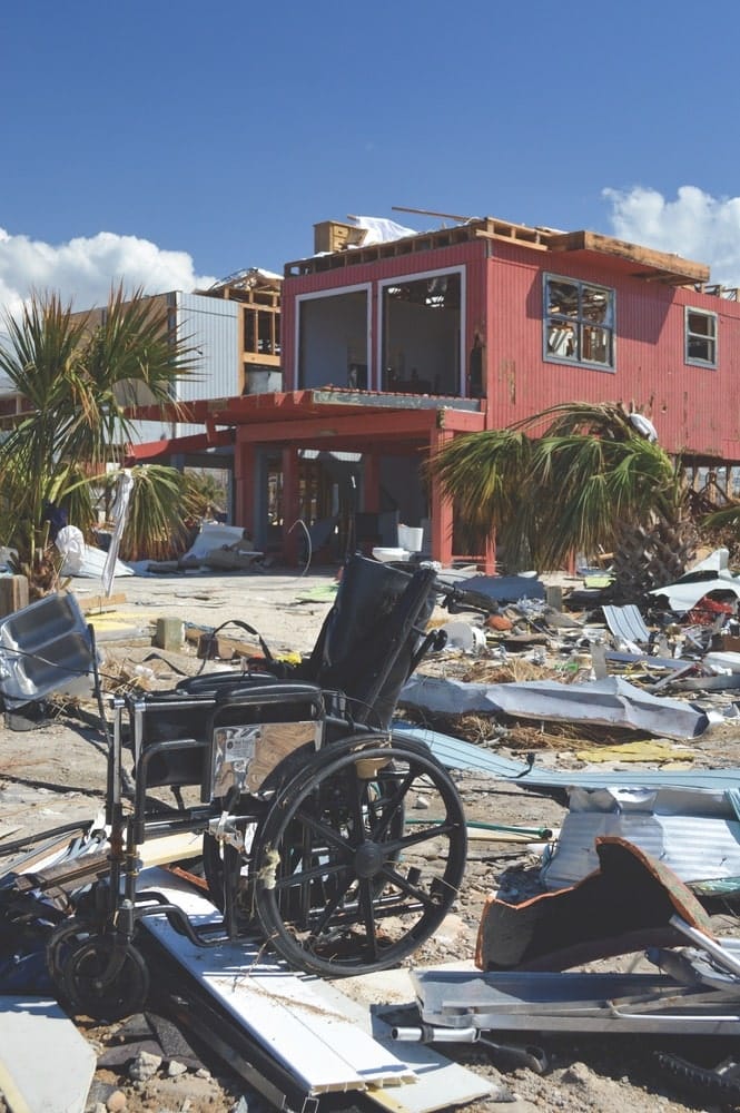 A lone wheelchair sitting on top of pieces of homes and trees displaced after the powerful storm Hurricane Michael attached the Panhandle of Florida.