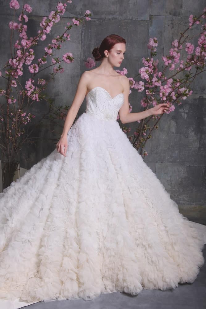 Girl modeling a wedding dress from the Christian Siriano Bridal line