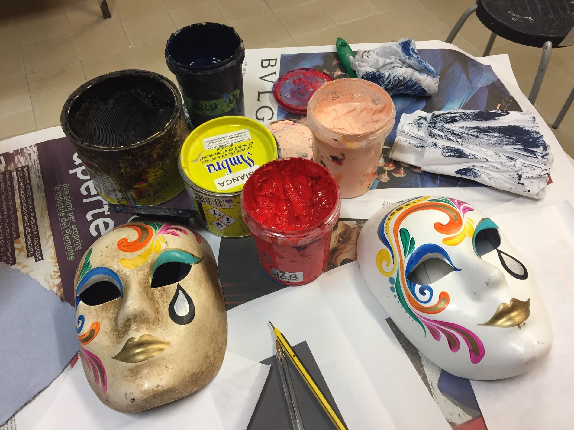 Paints and masks at Ca' Macana Carnevale Mardi Gras mask workshop in Venice, Italy