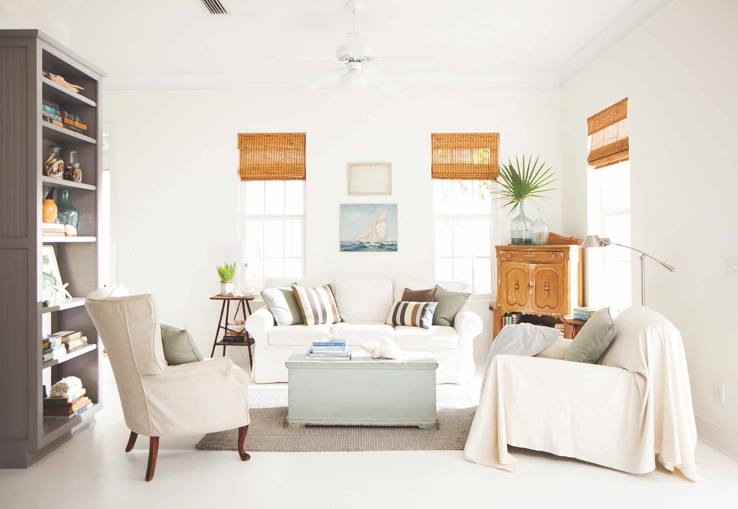 Interior designer Holly Shipman used beachy accents and a natural color palette for the inviting sitting room at this home in Seagrove Beach, Florida.