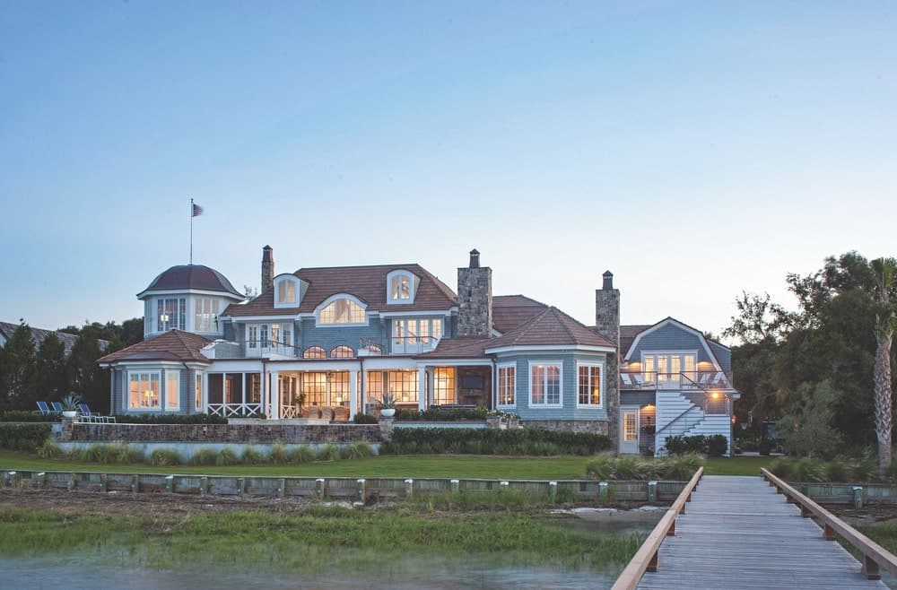 Exterior of a large Cape Cod style blue house shot by Richard Leo Johnson