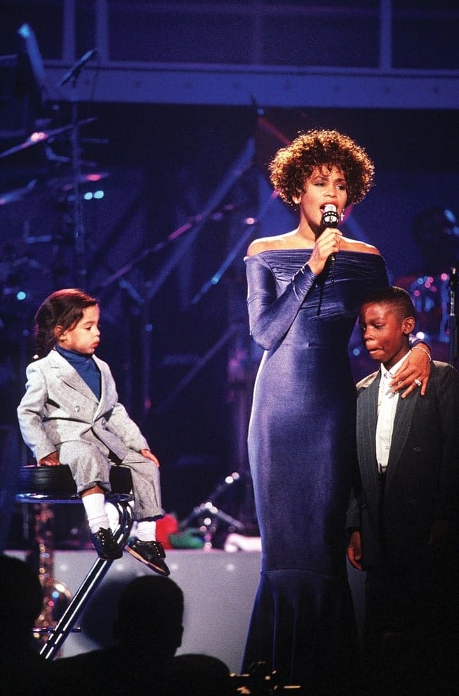 Whitney Houston performing at HBO’s Welcome Home Heroes event in 1991. Photo by Mark Kettenhofen / DefenseImagery