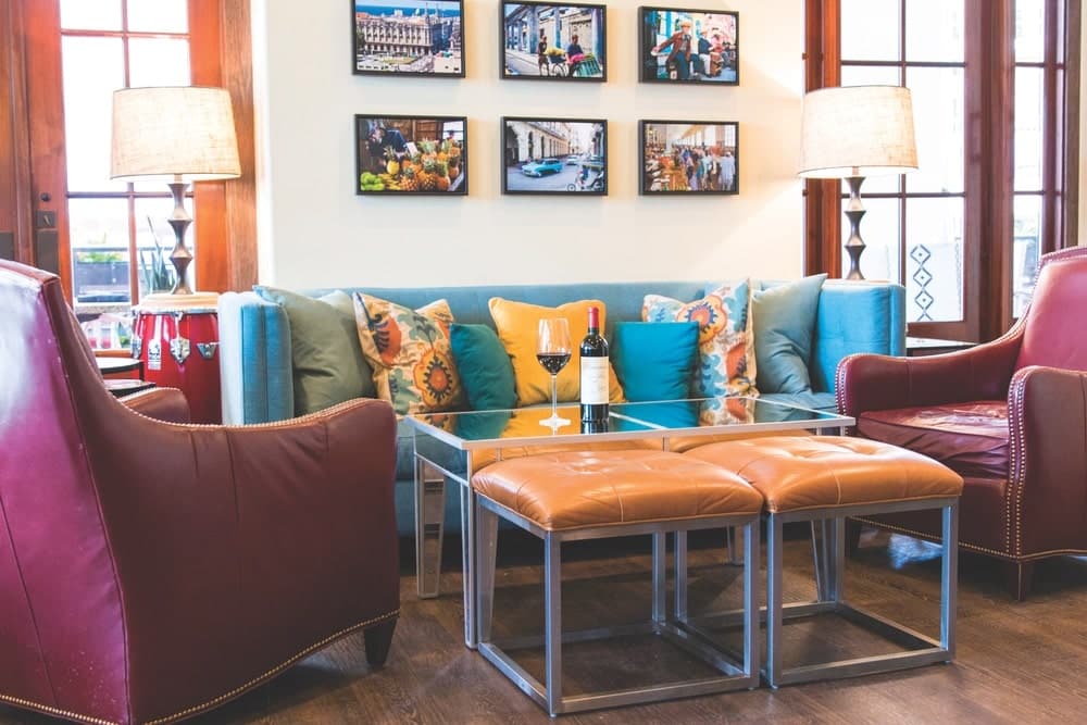 True to its namesake, the decor at Havana Beach Bar & Grill reflects bright colors, coastal flair, island-inspired prints, and photos of Cuba by Tommy Crow. | Photo courtesy of St. Joe Club & Resorts