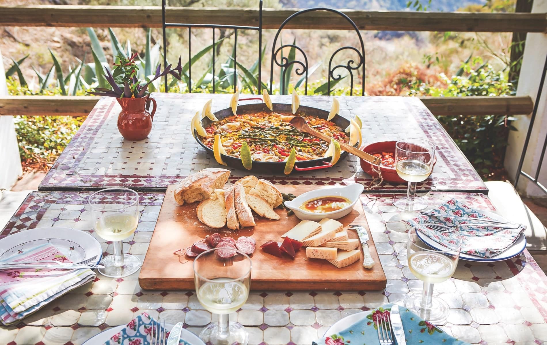 A seafood paella preceded by cheese, charcuterie, and bread with good olive oil is the quintessential Spanish celebration feast.