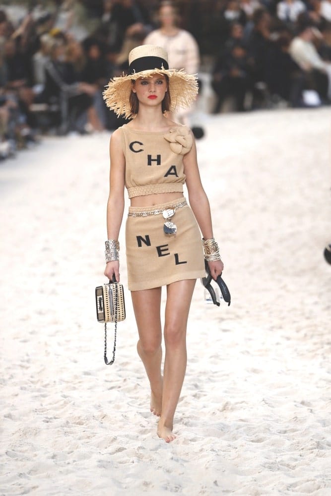 A model walks the runway during the Chanel show as part of the Paris Fashion Week Womenswear Spring/Summer 2019 on October 2, 2018 in Paris, France