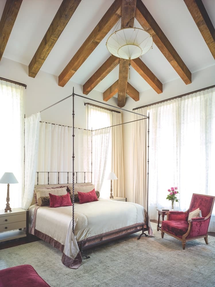 Gregorius Pineo’s custom seventeenth-century Italian iron bed is the focal piece of the master bedroom, A Boheme Design, A Boheme