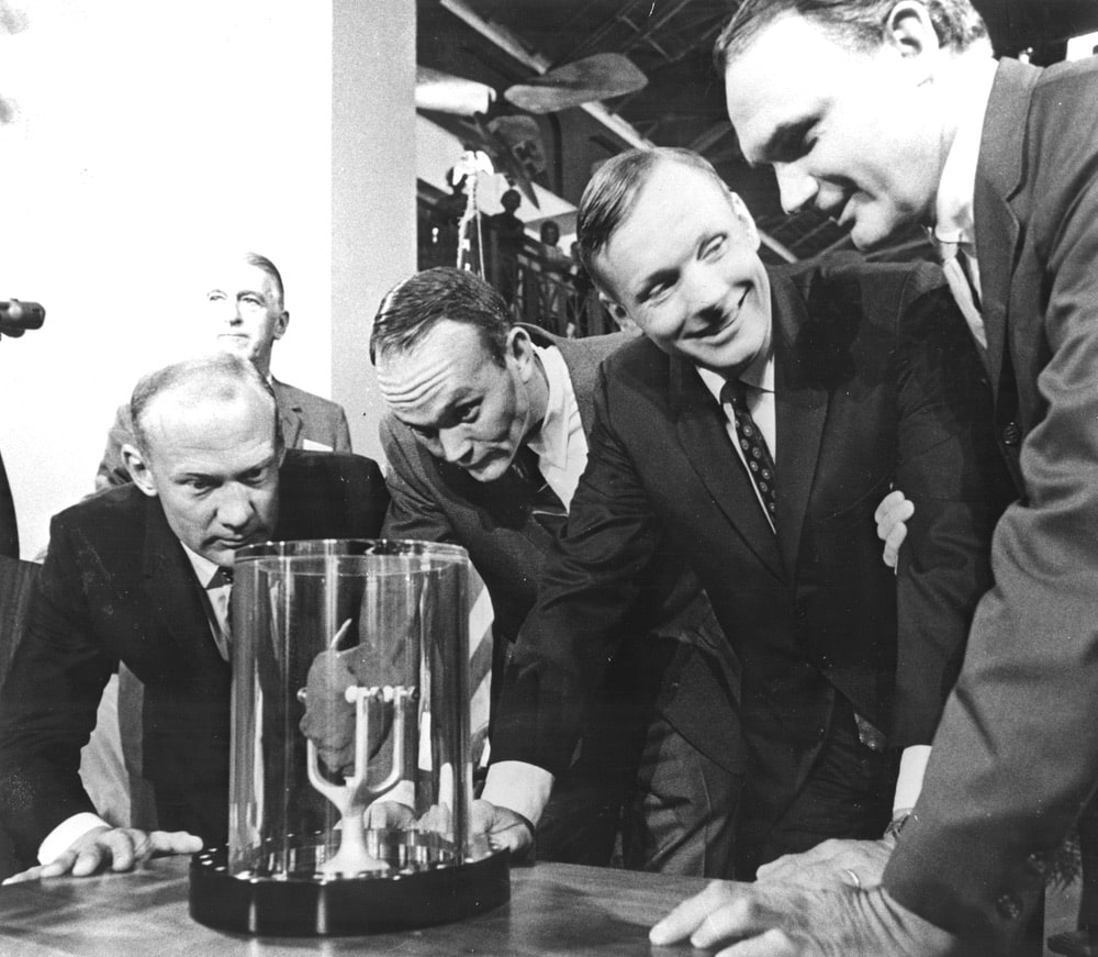 Apollo 11 astronauts, (left to right) Edwin E. Aldrin Jr., Lunar Module pilot; Michael Collins, Command Module pilot; and Neil A. Armstrong, commander, are showing a two-pound Moon rock to Frank Taylor, director of the Smithsonian Institute in Washington D.C. The rock was picked up from the Moon’s surface during the Extra Vehicular Activity (EVA) of Aldrin and Armstrong following man’s first Moon landing and was was presented to the Institute for display in the Art and Industries Building. The Apollo 11 mission, launched from the Kennedy Space Center, Florida via the Marshall Space Flight Center (MSFC) developed Saturn V launch vehicle on July 16, 1969 and safely returned to Earth on July 24, 1969. With the success of Apollo 11, the national objective to land men on the Moon and return them safely to Earth had been accomplished.Apollo 11 astronauts, (left to right) Edwin E. Aldrin Jr., Lunar Module pilot; Michael Collins, Command Module pilot; and Neil A. Armstrong, commander, are showing a two-pound Moon rock to Frank Taylor, director of the Smithsonian Institute in Washington D.C. The rock was picked up from the Moon’s surface during the Extra Vehicular Activity (EVA) of Aldrin and Armstrong following man’s first Moon landing and was was presented to the Institute for display in the Art and Industries Building. The Apollo 11 mission, launched from the Kennedy Space Center, Florida via the Marshall Space Flight Center (MSFC) developed Saturn V launch vehicle on July 16, 1969 and safely returned to Earth on July 24, 1969. With the success of Apollo 11, the national objective to land men on the Moon and return them safely to Earth had been accomplished. nasa, apollo 11 50th anniversary