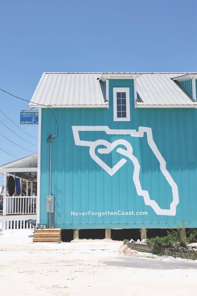 The Never Forgotten Coast logo adorns the side of the Mexico Beach Marina as the town recovers from Hurricane Michael nearly one year later.