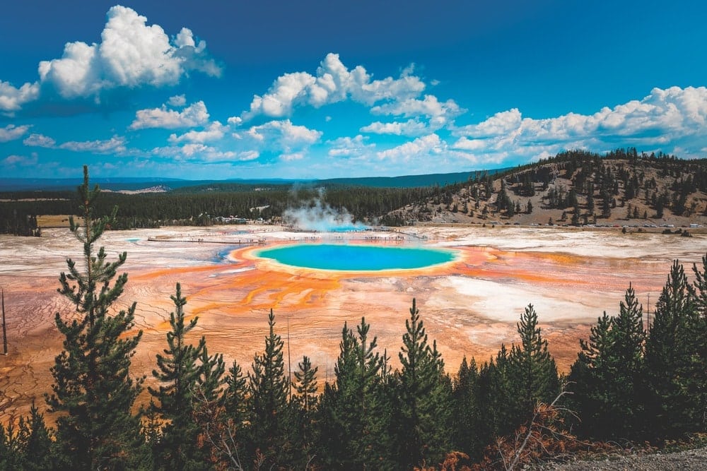 While the microbial mats and chemicals that create the rainbow explosion of color in this natural phenomenon might be complicated to some, its intriguing beauty can be appreciated by all. The Grand Prismatic Spring in Wyoming’s Yellowstone National Park discharges about 560 gallons of hot water per minute.