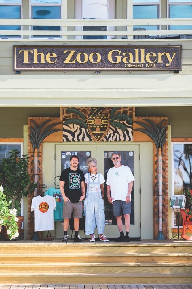 The Zoo Gallery visionaries Roxie and Chris Wilson with their son, Baxter (left), at the Grayton Beach store. The family has owned and operated the eclectic art gallery and retail destination in various locations on the Emerald Coast since 1979.