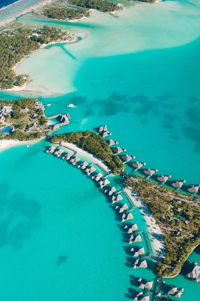 Aerial view of green water and bungalows, Bora Bora French Polynesia