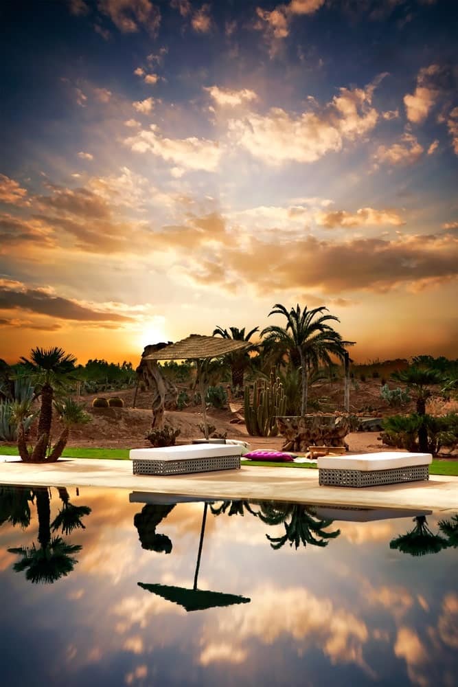 Beach beds with next at pool, hotel territory, Marrakesh Morocco