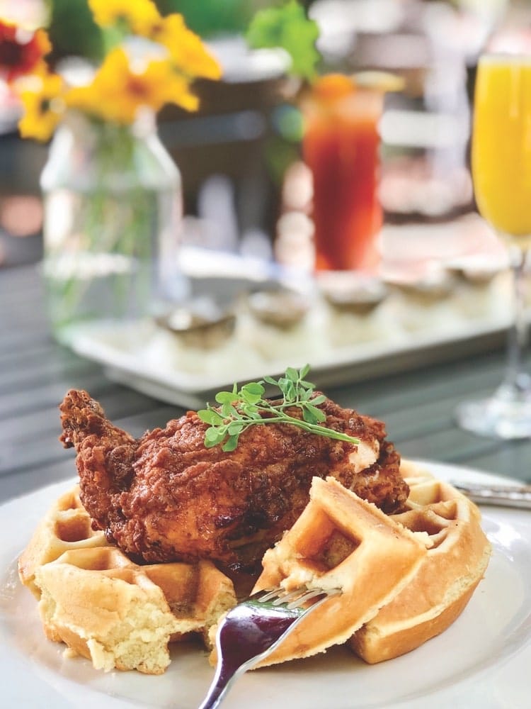Chef Shelley Cooper whips up incredible country favorites, such as chicken and waffles, at Dancing Bear Lodge and Appalachian Bistro near Townsend, Tennessee. | Photo courtesy of Dancing Bear Lodge