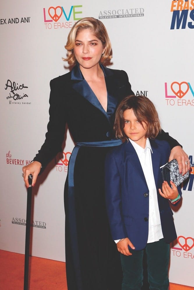 Selma Blair and her son, Arthur, walk the orange carpet at the Race to Erase MS Gala in Beverly Hills on May 10, 2019. Blair was honored at the event for demonstrating great bravery and strength during her personal battle with MS.