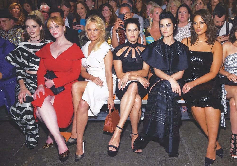 (L-R) Coco Rocha, Christina Hendricks, Pamela Anderson, Neve Campbell, Jaimie Alexander and Ashley Graham attend the Christian Siriano fashion show during New York Fashion Week: The Shows at ArtBeam on September 10, 2016 in New York City.