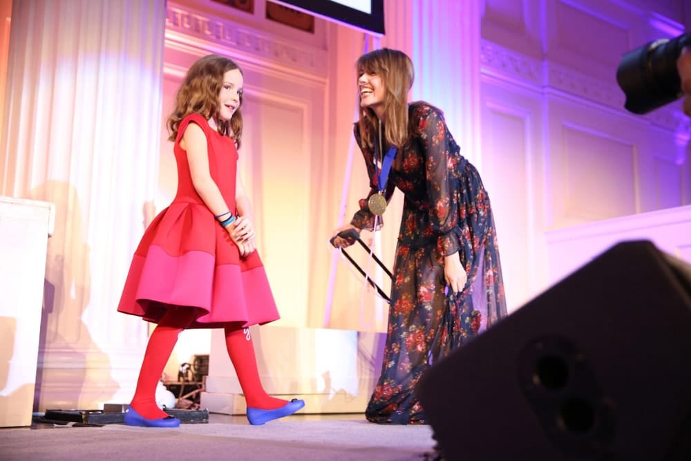 Honoree Claire Wineland accepts an award on stage during the World of Children Awards Ceremony