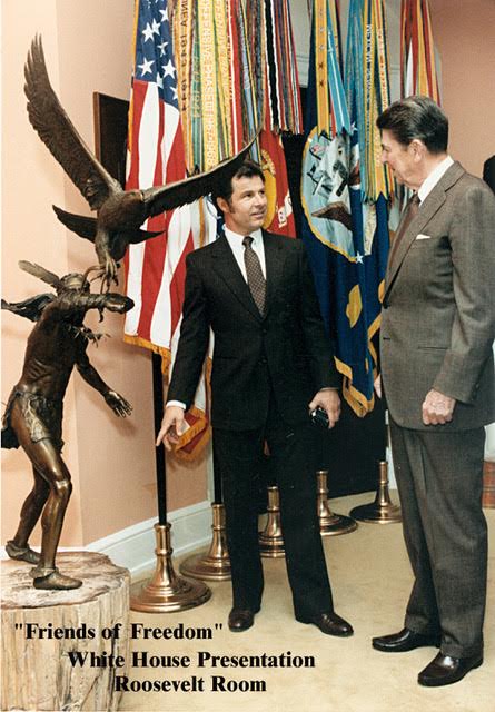 Artist Douglas Van Howd presents his sculpture "Friends of Freedom" to President Ronald Reagan | Photo courtesy of Van Howd Studios