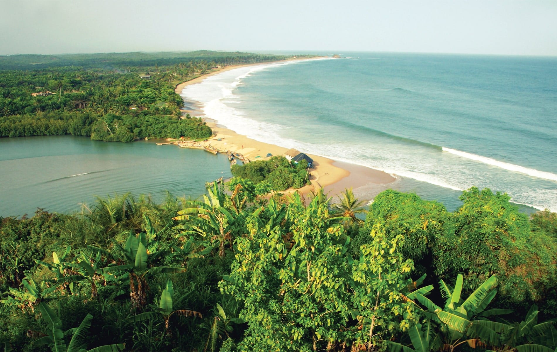 The coastline of Ghana on the Gulf of Guinea, where writer Suzanne Pollak lived for a period during her childhood