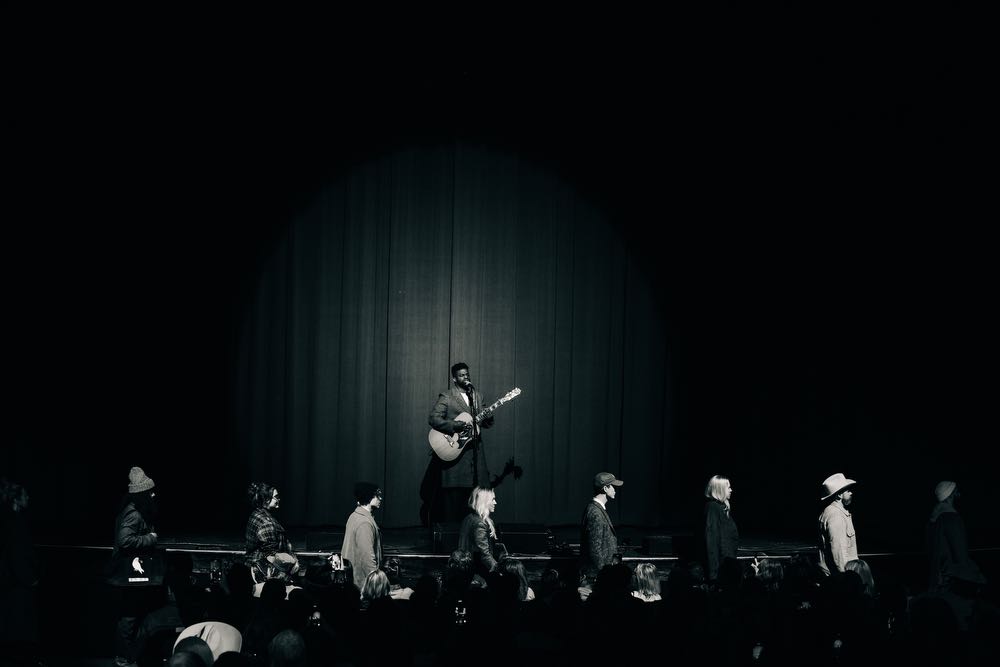 Abraham Alexander performs during Billy Reid’s twentieth-anniversary runway show at The Shoals Theatre. 